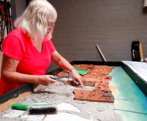 Read more about the article WomenzShed take on Thames mural restoration