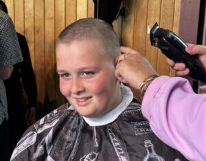 Read more about the article Hair hair! Students raise $8k for cause